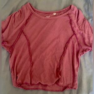Small, purple-ish red, ribbed with textured lining baby doll tee!